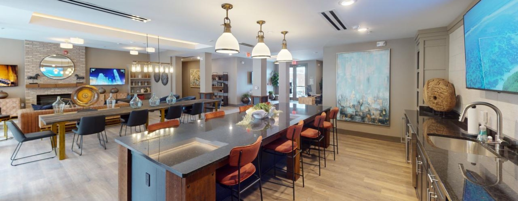clubhouse with kitchen couch and chairs